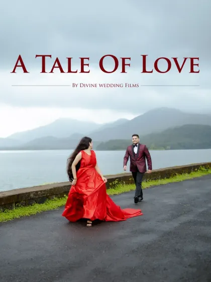 "A Tale of Love." The bride's flowing red gown against the backdrop of the mountains and lake creates a dramatic and cinematic pre-wedding poster shot.