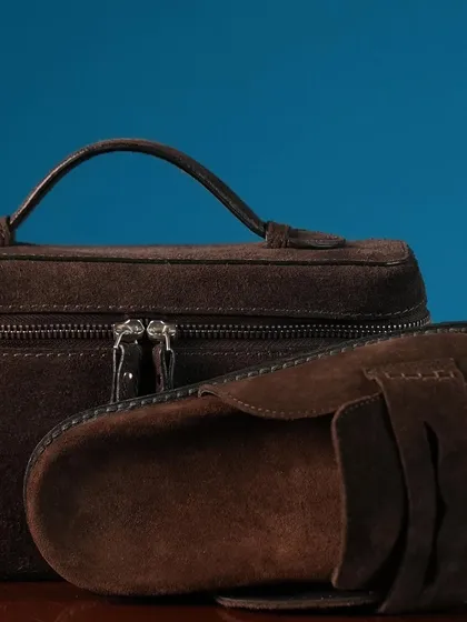 A close-up on the texture and hand-stitching of the Suede Alba mule and Vault Bag. It’s these small, intentional details that define the quality and feel of my work, ensuring each piece is a pleasure to own and wear.