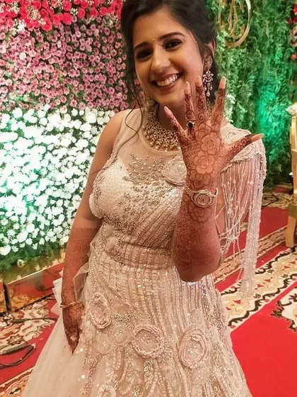 A happy bride showing off her engagement mehendi. I design for all wedding occasions, ensuring the art is just as special for your engagement ceremony as it is for the wedding day.