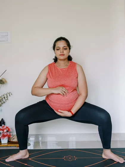 The Goddess Pose (Utkata Konasana) is a powerful asana for expecting mothers. Here, I demonstrate the pose, which is excellent for opening the hips, strengthening the thighs, and building stamina for labor.