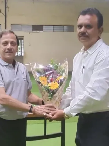 We honored the father of Om Bhosale, one of our successful players, at the meeting. He shared his experiences with the academy and credited our facilities and coaching for his son's success, inspiring other parents.