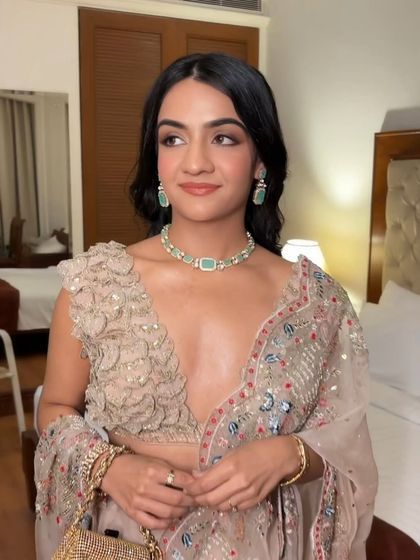 Srestha's Roka look. A beautiful, fresh face with a subtle winged liner and a nude lip, perfect for the occasion.