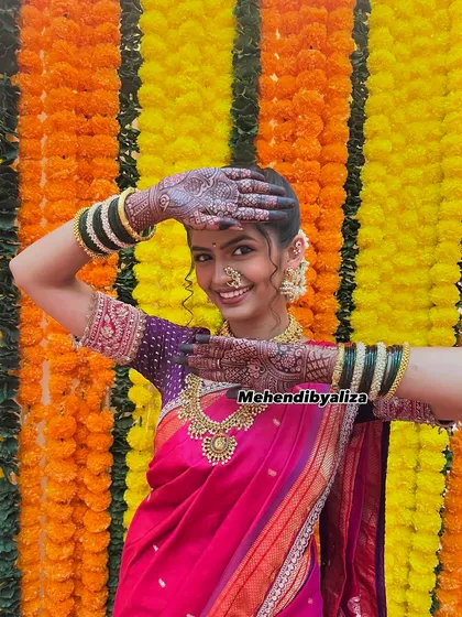 A fun shot with actress Rumani Khare on the set, showcasing her beautiful bridal mehendi.