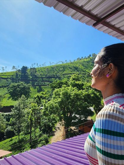 That feeling of pure bliss when the sun hits your face and you're surrounded by nature. A candid moment from a mountain morning.