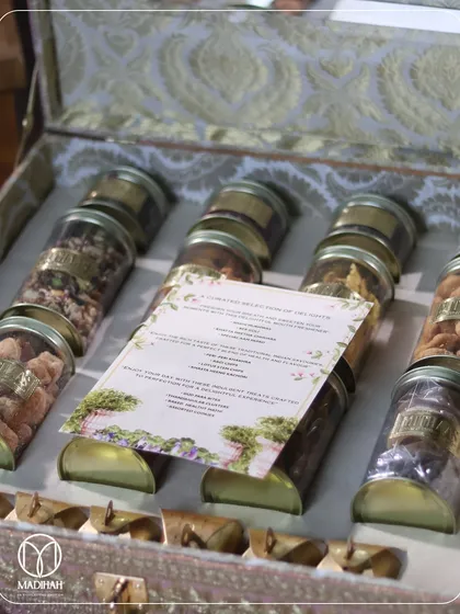 The unboxing experience of a Bhaji Box. I include a personalized menu card that details the handpicked selection of treats, adding a thoughtful and informative touch.