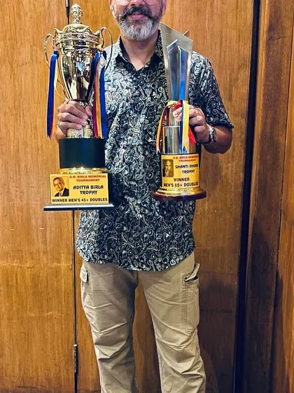 I lead by example, bringing my experience from the competitive circuit directly to you. Here I am after securing a double crown in the Men's Doubles 45+ and Men's Combination 85+ at the GD Birla Championship.