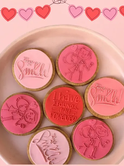 A little sweetness goes a long way. Our Valentine's cookies are stamped with cute messages like "I have found my forever" and "You make me smile."