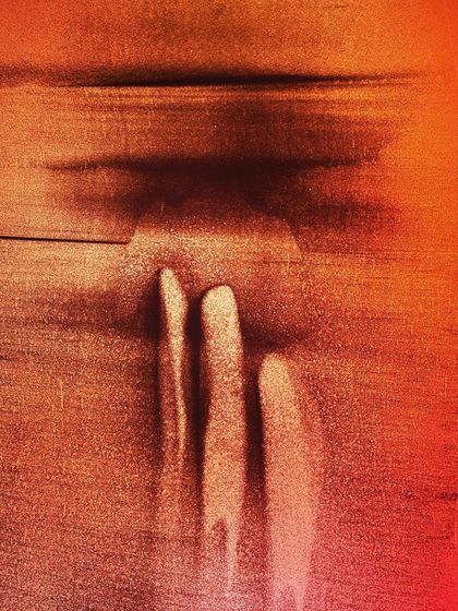 Titled 'Three Left', this abstract sand painting evokes a sense of mystery. The three fading forms against a textured background are open to interpretation.