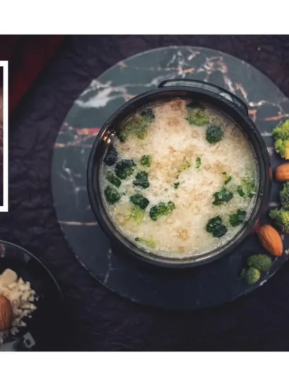 The flavors that can take you down a memory lane. A beautifully shot image of our broccoli and almond soup, highlighting the fresh ingredients.