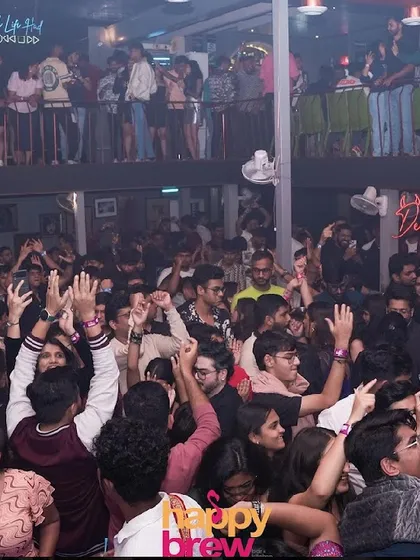 The view of the packed, two-level dance floor at Happy Brew. The energy when the whole place is jumping is absolutely incredible.