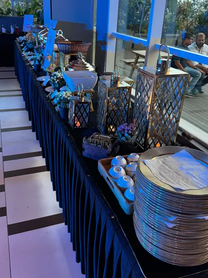 For a corporate dinner for L'Oréal India, we created a sophisticated buffet line. The setup featured elegant lanterns and a dark linen theme to match the brand's glamorous style, complete with a full range of our vegetarian dishes.