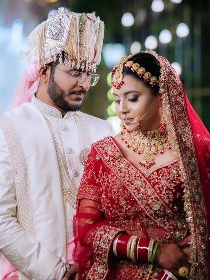 The bride and groom together. Notice how the makeup looks balanced and natural, allowing the couple's connection to be the focus.