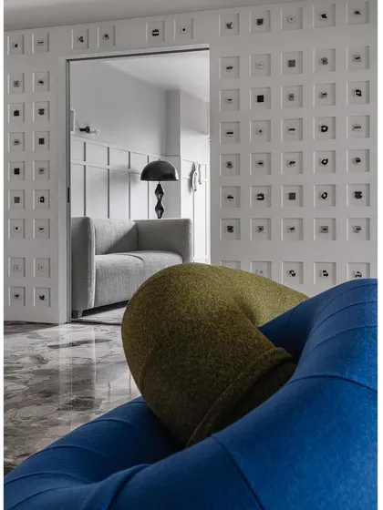 Frenchie Haus is an urban oasis we crafted for a dynamic young couple and their beloved French Bulldogs. The living room features playful furniture and a unique Morse code wall that tells the couple's story, proving that a home can be both creative, deeply personal, and comfortable for every member of the family, including the furry ones.