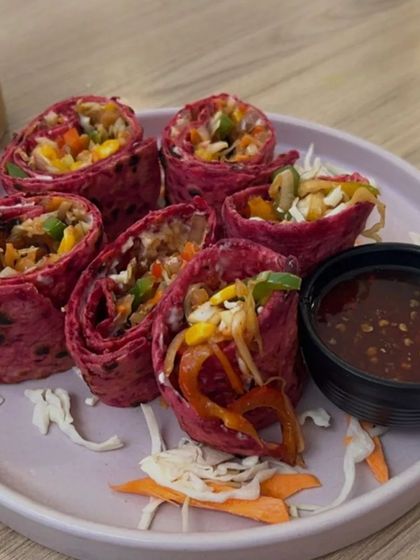 A closer look at my beetroot and vegetable rolls, served with a sweet chilli dipping sauce. They are as beautiful as they are tasty.