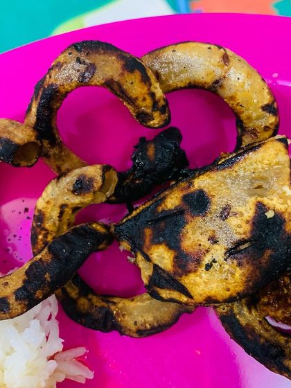 The unique texture of dried and roasted pork intestine, a crispy and savory side dish.