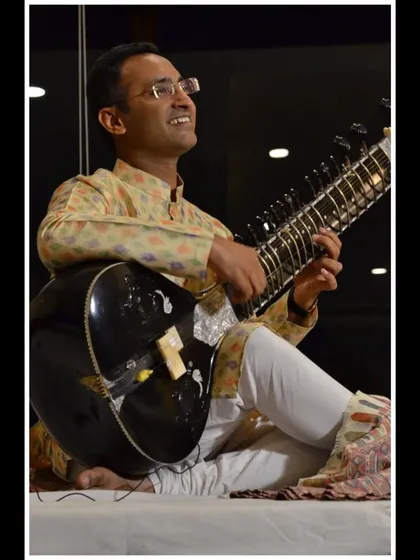 Looking up during a melodic phrase, completely absorbed in the performance. These concerts are a meditative experience for both the artist and the listener.