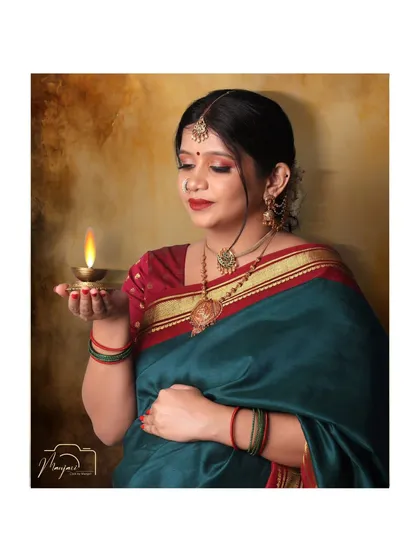 A close-up with a glowing diya, symbolizing light, hope, and divinity. A deeply spiritual and beautiful portrait.