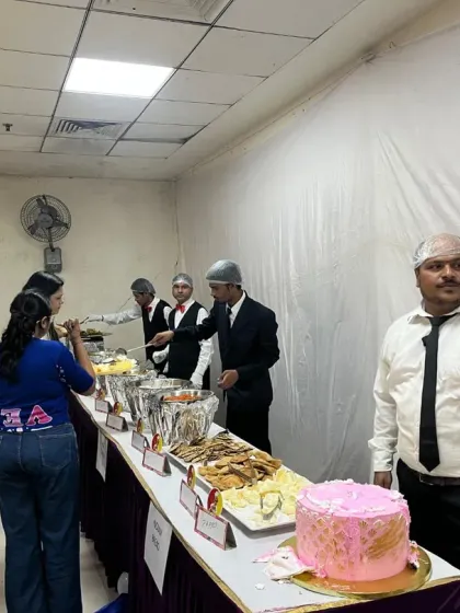 The main buffet line at a 5th birthday party. Even for smaller events, we provide a full spread and professional service.