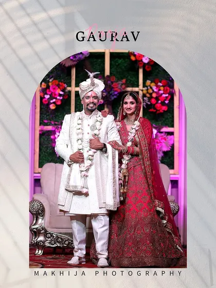 A beautifully framed portrait of the wedding couple. The archway design adds a creative touch, making this a unique and memorable shot from their big day.