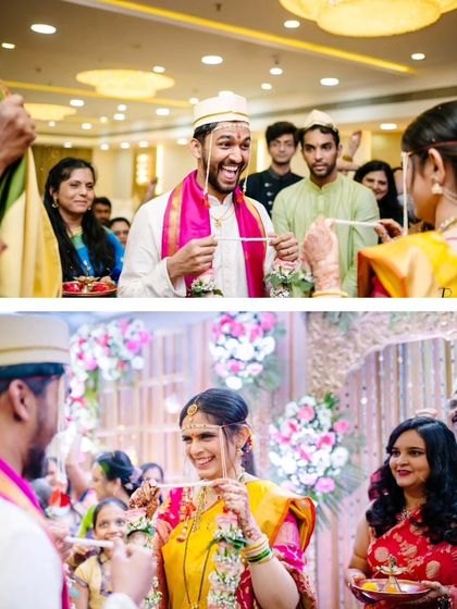 The 'antarpat' ritual, where the bride and groom see each other for the first time, filled with smiles and anticipation.