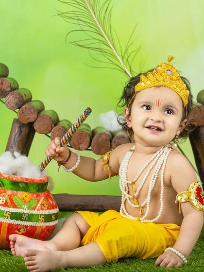 Another adorable shot from a Janmashtami session, with our little Krishna ready to cause some mischief with his pot of butter.