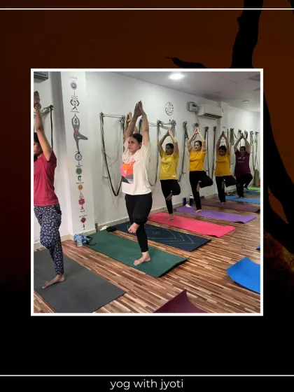 Students practicing Vrikshasana (Tree Pose), a foundational pose for improving balance and grounding.