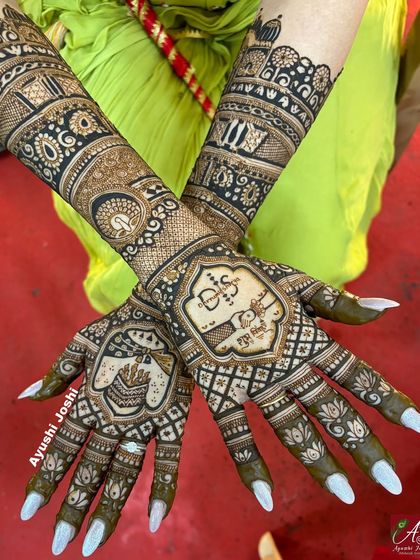 A unique design featuring a 'save the date' element with the couple's initials, surrounded by traditional elephant and peacock motifs.