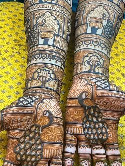 A close-up of the peacock bridal mehndi, showing the rich color and sharp details achieved with my natural henna.