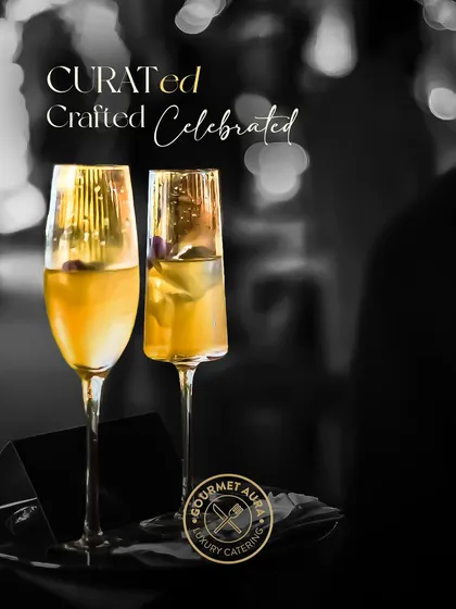 Curated, crafted, and celebrated. Two elegant champagne flutes are served on a tray, capturing a moment of refined celebration. Our premium bar service ensures the drinks are as memorable as the food.
