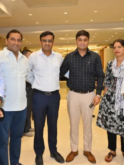 With both male and female colleagues at an event. Our strength lies in our diversity and unity.