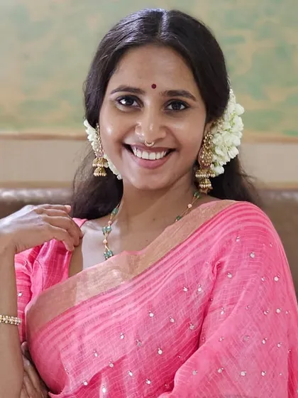 A simple portrait in a pink saree, taken by my mother. Her support and encouragement mean the world to me.