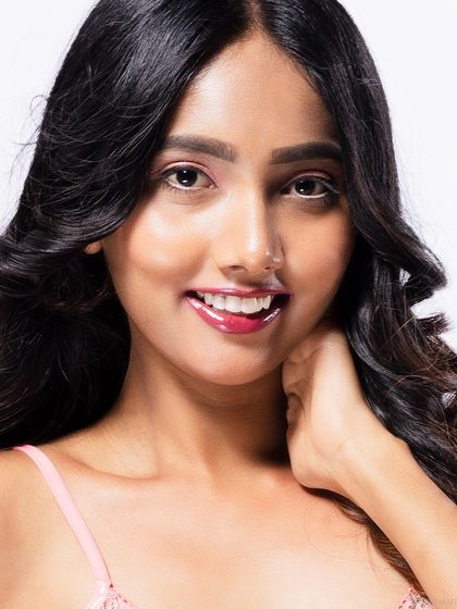 A smiling beauty close-up, capturing a moment of joy.