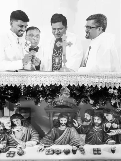 A creative composition juxtaposing the wedding ceremony with the "Last Supper" carving on the altar. This adds a layer of artistic and religious symbolism.