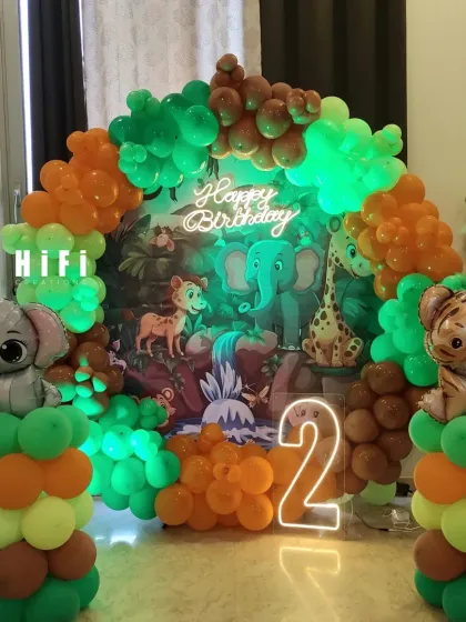 A complete view of the colorful jungle-themed second birthday, perfect for a home celebration.