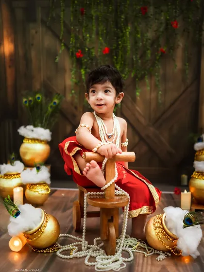 A sweet smile from the seat of his tricycle. This portrait is a beautiful blend of playful and divine.