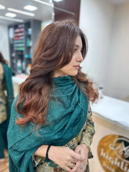 The side profile shows the soft layers and beautiful color of this transformation.