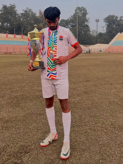 A moment of pride. One of our U19 players with the runner-up trophy from the Tier 2 Delhi Future Stars Youth League. Individual dedication contributes to team success.
