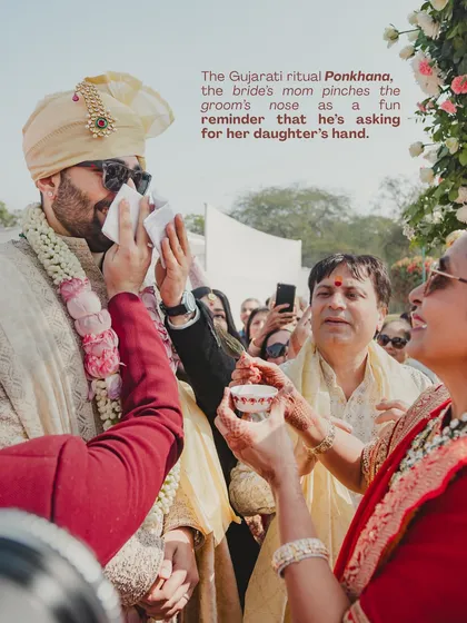 The playful Gujarati ritual of Ponkhana, where the bride's mother pinches the groom's nose. Capturing and making space for these fun, meaningful traditions is at the heart of what we do.