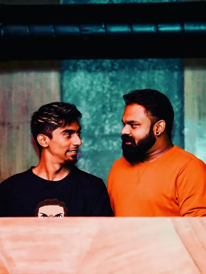 Sharing a look with my friend behind the decks. The unspoken communication between DJs is a language of its own.