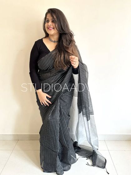 You can never go wrong with a black saree. Our striped handloom cotton in black is a versatile piece that can be dressed up or down for any event.
