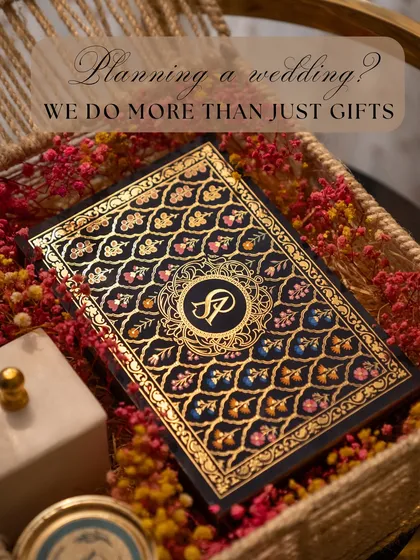 We believe the first impression is everything. This intricately designed wedding invitation box, nestled in a bed of flowers, sets a tone of elegance and anticipation for your special day.