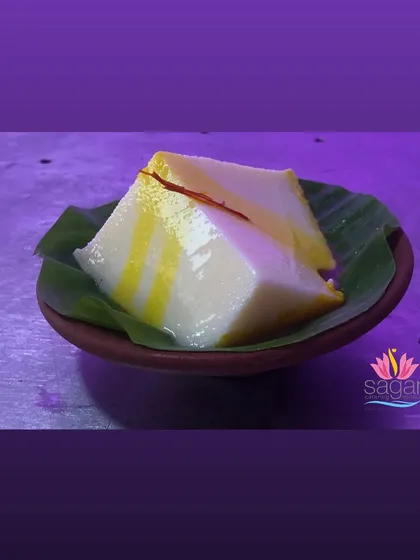 This is Kharvas, a traditional Maharashtrian milk pudding. Its delicate, jiggly texture and subtle sweetness make it a unique and beloved dessert, which I serve simply on a banana leaf.