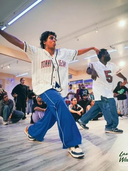 The iconic duo, Arunn and Divya, striking a powerful pose during their Collab Series performance.