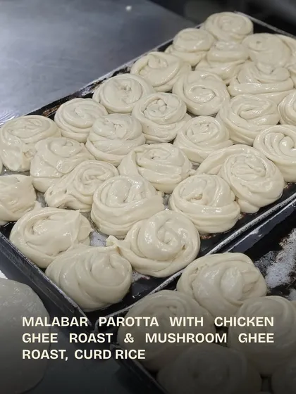 This is what our team meals look like. Here, our chefs have prepared Malabar Parottas, which are rolled and ready for the griddle.