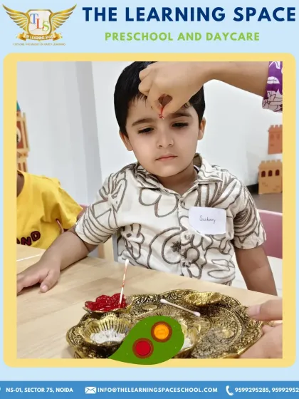 A young boy receives a tilak on his forehead, marking the beginning of our India Day celebrations. It’s a beautiful way to connect with the rich traditions of the country.