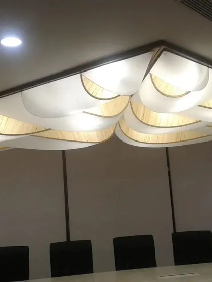 For the RGA Tech Park boardroom, I designed this unique, cloud-like ceiling fixture. It acts as a centerpiece, providing excellent illumination while adding an artistic touch to a critical meeting space.