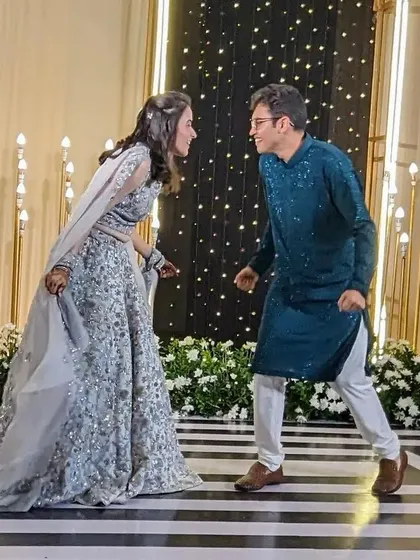 My goal is zero stress, all fun. I want you to laugh while you learn and just be yourselves on stage. This fun, candid moment between the bride and groom is what it's all about.