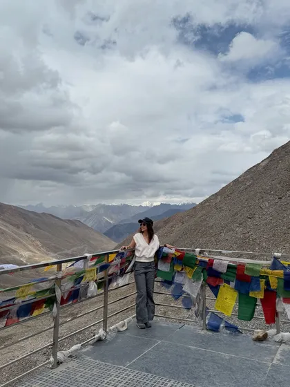 Standing amidst the prayer flags at a high mountain pass in Ladakh. Each flag sends a prayer on the wind, and being here feels like you are part of that collective offering of peace.