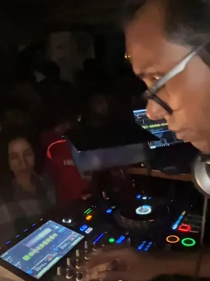 Deep in concentration, selecting the perfect track to mix in. Every song has its place in the journey of a DJ set.