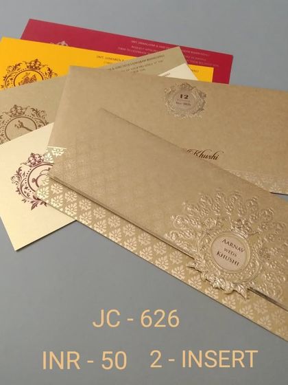 This long, pocket-style invitation comes in a classic gold color with colorful inserts. It's an affordable and elegant option for a traditional wedding.